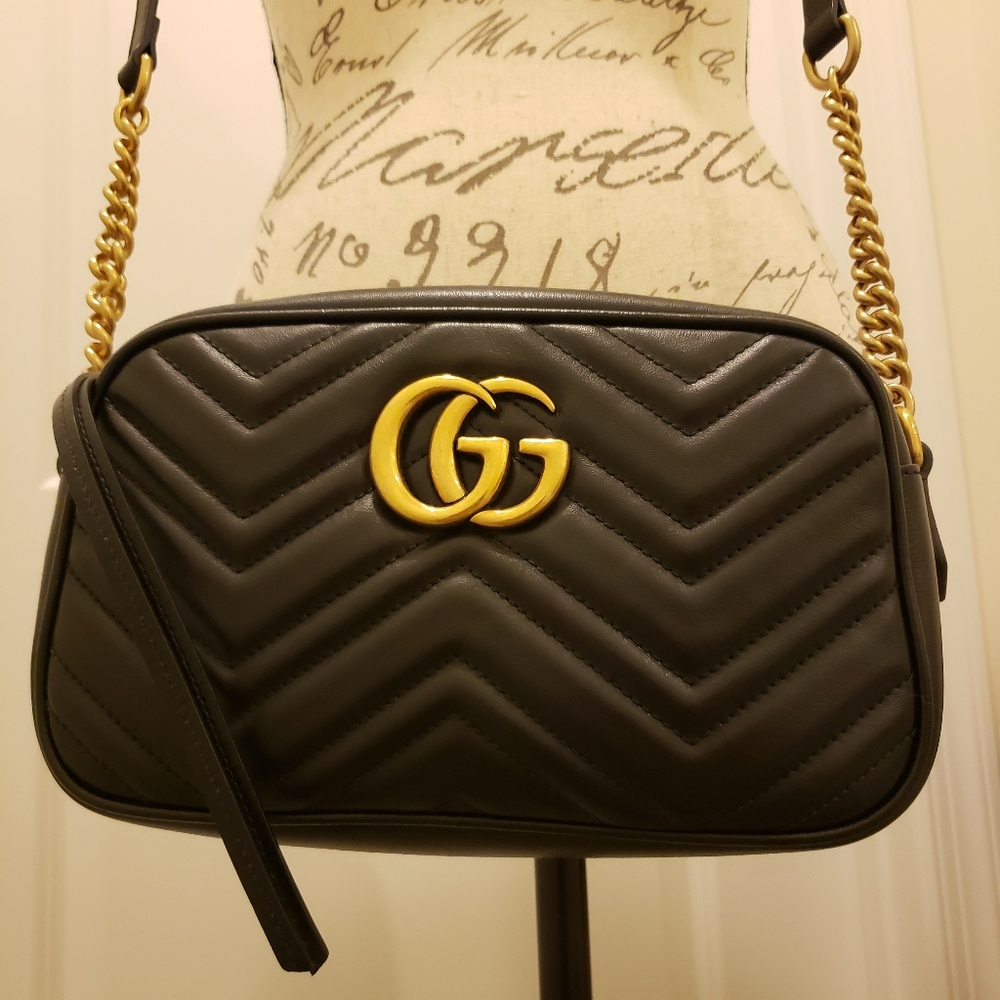 Gucci, GG shoulder bag.